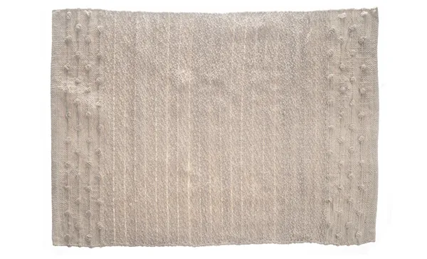 FRACCI handwoven boho rug — natural beige fiber, soft texture, perfect for cozy event setups in Dubai.